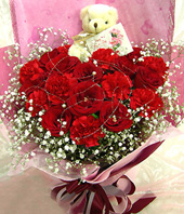 10 Red carnations,8 red roses,a bear